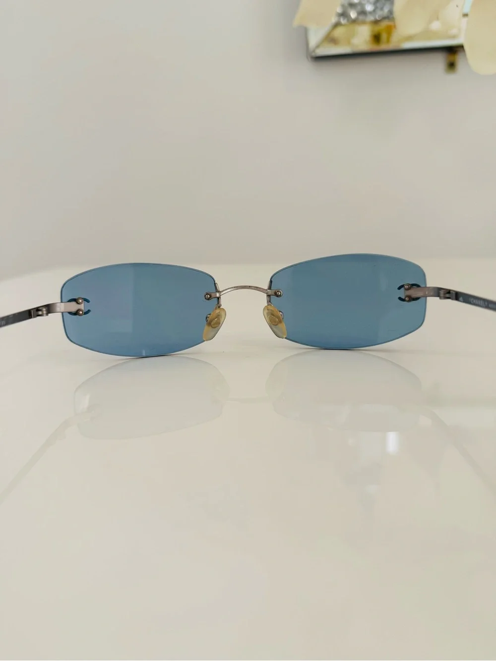 RARE 💫 vintage Chanel blue rimless sunglasses.